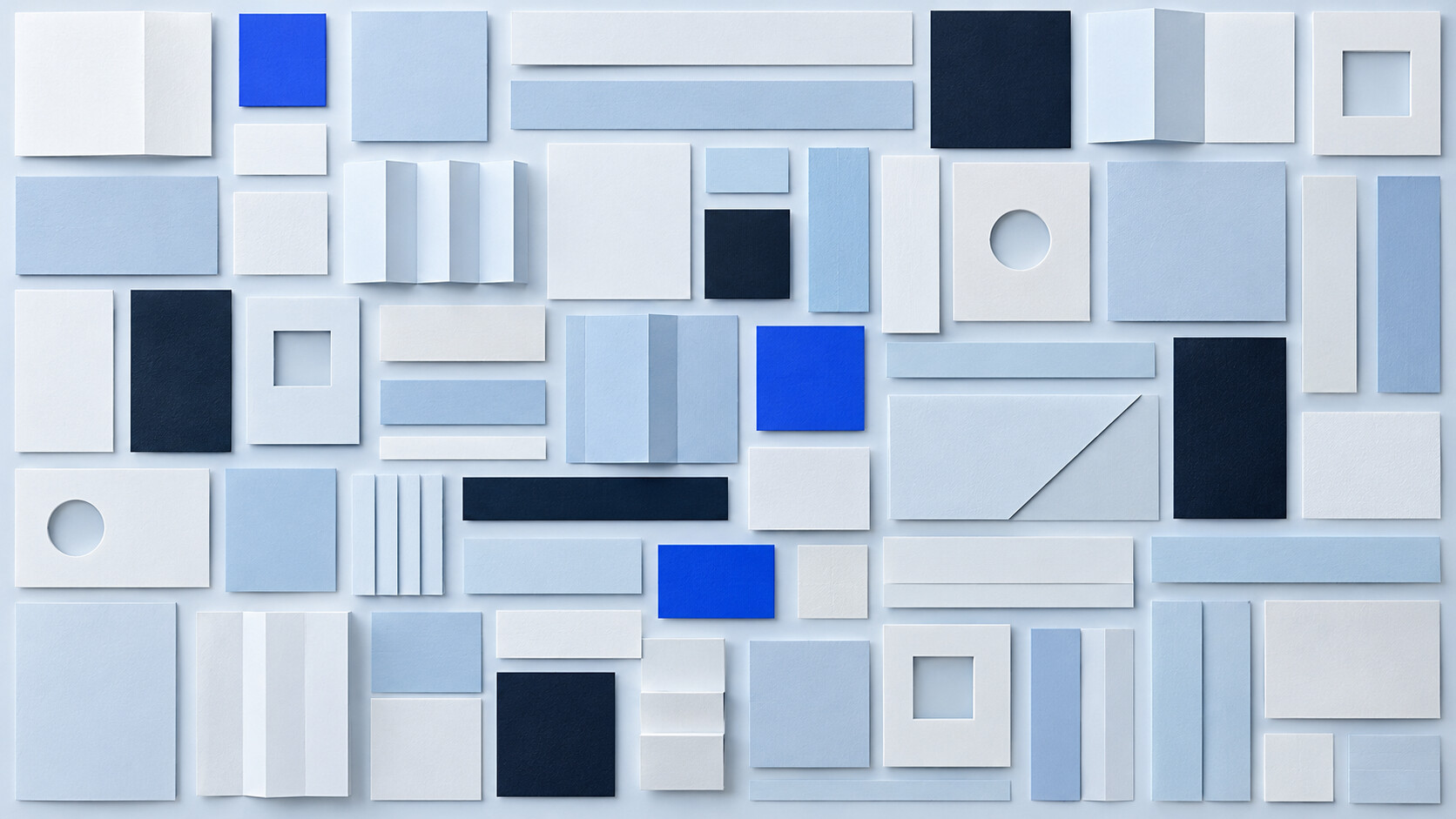 A grid of paper tiles in many shapes, laid out like a library of components.